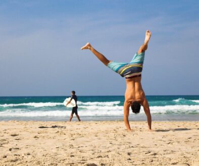 handstand man beach sea ocean 2224104